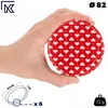 A hand holding a red lid with white hearts on it. Podgląd zdjęcia produktu