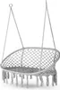 A white macrame hanging chair with tassels, suspended by ropes. Náhľad obrázku produktu