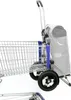 A close-up side view of a shopping trolley with a gray bag attached. Produktbild-Vorschau