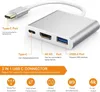 A silver USB-C hub adapter with multiple ports, shown with labels and feature descriptions. Produktbild-Vorschau