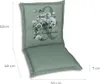 A green chair cushion with a floral design and text. Produktbild-Vorschau