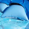 An inflatable pool cushion is shown floating on water. Produktbild-Vorschau