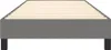 A close-up side view of a dark grey upholstered bed frame with wooden slats. Voir les images du produit