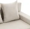 A close-up view of a light gray corduroy couch with pillows. Produktbild-Vorschau