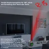 A living room scene with a TV, furniture, and a projection clock displaying time on the ceiling. Produktbild-Vorschau