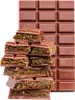 A stack of broken chocolate pieces with a filling, in front of a full chocolate bar. Podgląd zdjęcia produktu