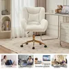 A collage showing a fluffy white office chair with gold legs, and four smaller images depicting different uses of the chair: reading, working on a laptop, watching TV, and socializing. Produktbild-Vorschau