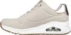 A side view of a single women's sneaker. Produktbild-Vorschau