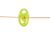 A close-up shot of a green spinning toy with an orange string running through it, set against a white background. Produktbild-Vorschau