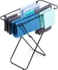 A black metal drying rack with several towels of different colors draped over it. Voir les images du produit