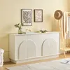 A white sideboard with arched doors is displayed in a room with yellow walls and a rug. Anteprima dell’immagine prodotto