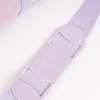 A close-up view of a purple strap with textured padding, part of a backpack. Produktbild-Vorschau