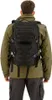 A person wearing a backpack. Produktbild-Vorschau