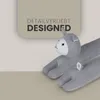 A close-up marketing image of a gray fabric draft stopper shaped like a cat, with text overlay. Náhľad obrázku produktu
