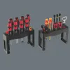Two black tool racks holding screwdrivers and a bottle opener. Produktbild-Vorschau