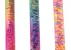 Three colorful glitter wands against a white background. Produktbild-Vorschau