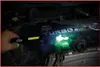 A hand holding a flashlight illuminates a car engine component with the word "TURBO" visible. Náhľad obrázku produktu