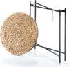A round woven table top is shown attached to a black metal folding frame, against a white background. Produktbild-Vorschau
