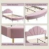 A collage of four images showcasing a pink upholstered bed frame and its features. Produktbild-Vorschau