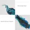 A collage of images showing a decorative peacock ornament, highlighting its features. Produktbild-Vorschau