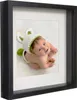 A framed baby photo. Náhled obrázku produktu