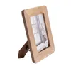 A wooden picture frame is shown against a white background. Podgląd zdjęcia produktu