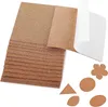 A stack of rectangular cork sheets with some cut-out shapes of cork in various forms. Produktbild-Vorschau