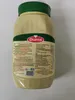 A close-up of a jar of tahini with its label visible. Produktbild-Vorschau