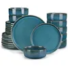 A set of blue ceramic dishes, including plates and bowls, neatly stacked and arranged. Náhled obrázku produktu