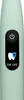 Close-up of a green electric toothbrush handle with a control panel. Voir les images du produit