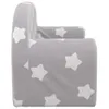 A side view of a child's armchair with a grey fabric cover featuring a white star pattern. Produktbild-Vorschau