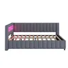 A side view of a dark gray upholstered bed frame with a slatted mattress support and pink LED lighting on the headboard. Náhled obrázku produktu