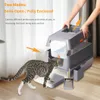 A cat is walking near a litter box, and hands are shown assembling the litter box. Náhľad obrázku produktu