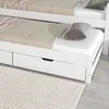 A close-up view of a white daybed with two drawers underneath, showing the mattress and a pillow. Produktbild-Vorschau