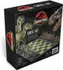 The image shows the packaging of a Jurassic Park themed chess set, featuring dinosaurs and the Jurassic Park logo. Podgląd zdjęcia produktu