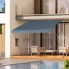 An awning is extended over a patio area next to a swimming pool. Produktbild-Vorschau