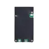 A top-down view of a black electronic component with silver screws and a small green circuit board. Náhľad obrázku produktu