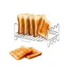 A chrome toaster rack filled with slices of toast, with two additional slices of toast in the foreground. Podgląd zdjęcia produktu