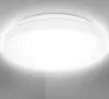 A close-up view of a white, circular ceiling light fixture mounted on a white ceiling. Náhľad obrázku produktu