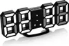 A digital clock with large LED numbers and a stand. Produktbild-Vorschau