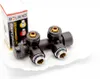 A product shot of a black radiator valve set with a box in the background. Produktbild-Vorschau