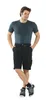 A man is standing and posing in front of a white background, wearing a t-shirt and shorts. Produktbild-Vorschau