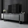 A modern living room with a TV stand and television. Voir les images du produit