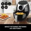 An air fryer with a basket of fries and a plate of chicken nuggets and fries are shown on a wooden table. Text overlays highlight product features and benefits. Produktbild-Vorschau