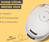 A close-up of a white rice cooker with text elements promoting its features. Anteprima dell’immagine prodotto
