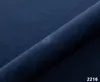 A close-up view of a dark blue fabric, possibly a bedspread or upholstery, with a rolled edge creating a diagonal line across the image. Náhled obrázku produktu