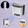 A collapsible trash can with a dispenser for trash bags, shown with close-up views of its features. Náhľad obrázku produktu