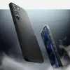Two black smartphone cases are shown in a dynamic, smoky environment. Náhľad obrázku produktu