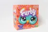 A product box for a Furby toy, featuring a colorful, fuzzy design and the Furby logo. Podgląd zdjęcia produktu