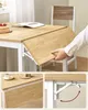 A dining table with extendable leaves, shown in various configurations and details. Náhled obrázku produktu